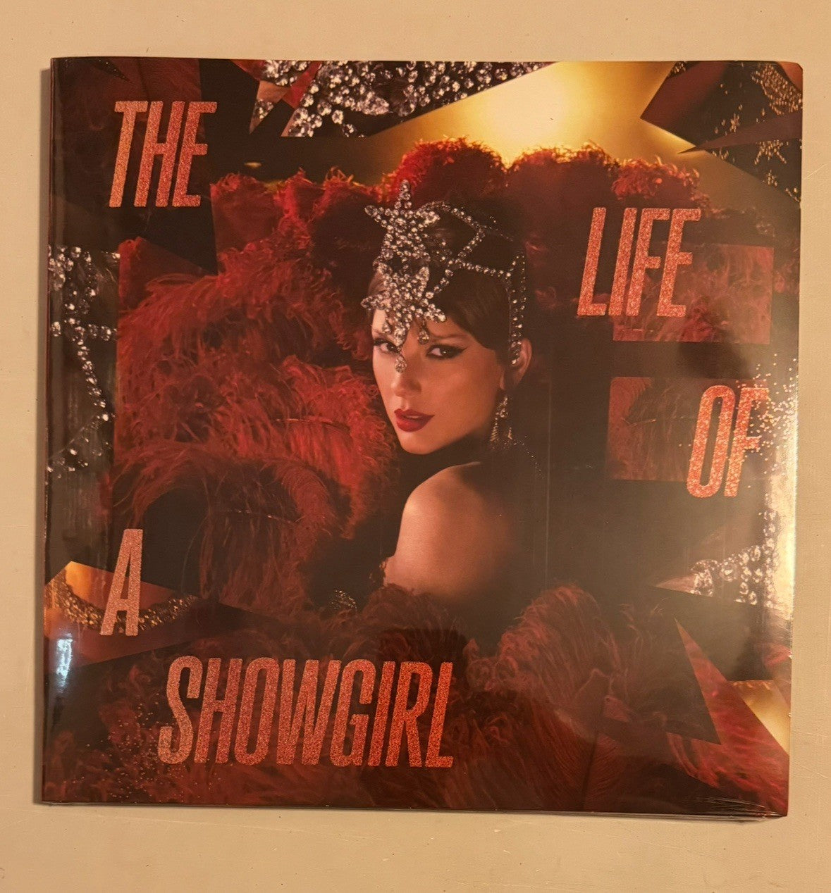 The Life of a Showgirl: The Tiny Bubbles in Champagne Edition Red Lipstick Vinyl