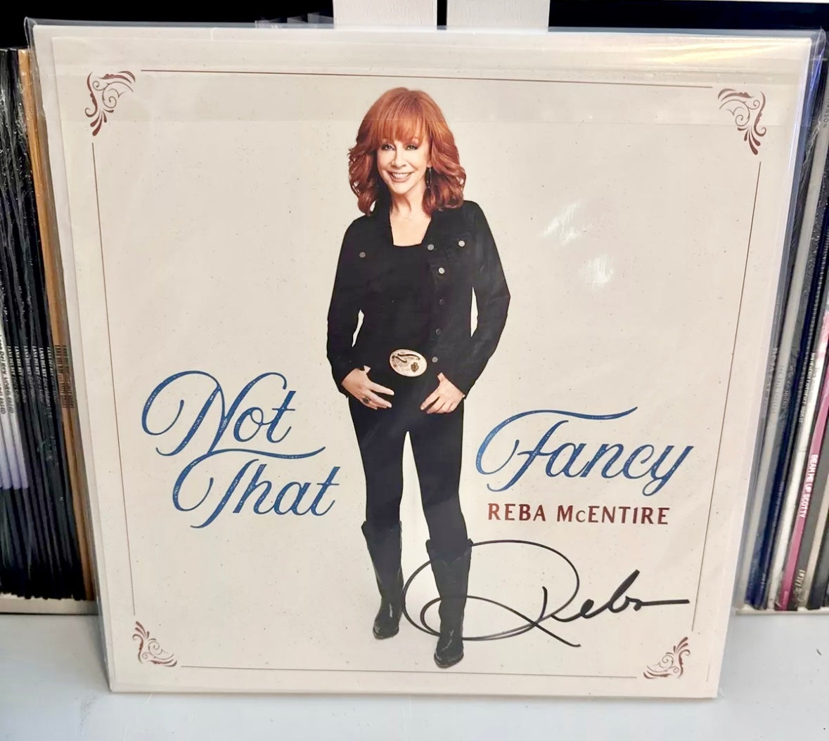 Reba McEntire - (Autographed) Not That Fancy, Blue Vinyl (12x12 signed insert)